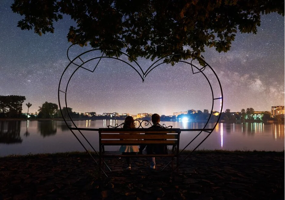 Couple sitting in a romantic area